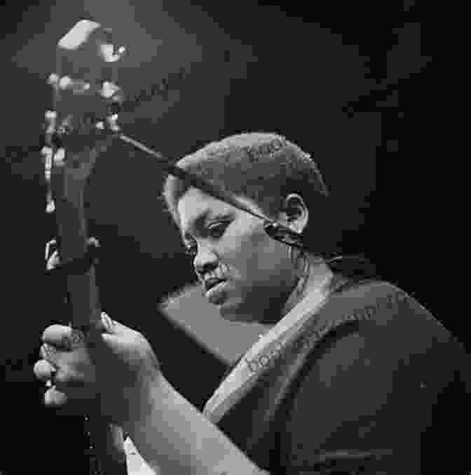 A Young Odetta Performing On Stage Odetta: A Life In Music And Protest