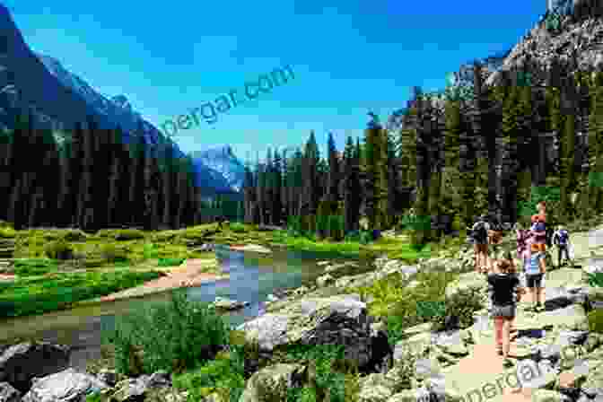 Hikers Admire The Grandeur Of Grand Teton Teewinot: A Year In The Teton Range